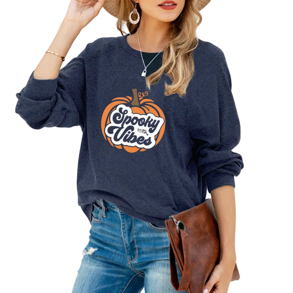 Women wearing halloween pumpkin print loose fit long sleeve cotton t shirt