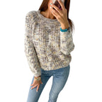 Women wearing loose round neck knit sweater pullover in casual style