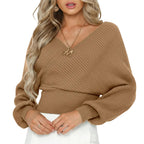 Women loose solid color polyester sweater with lantern sleeve style